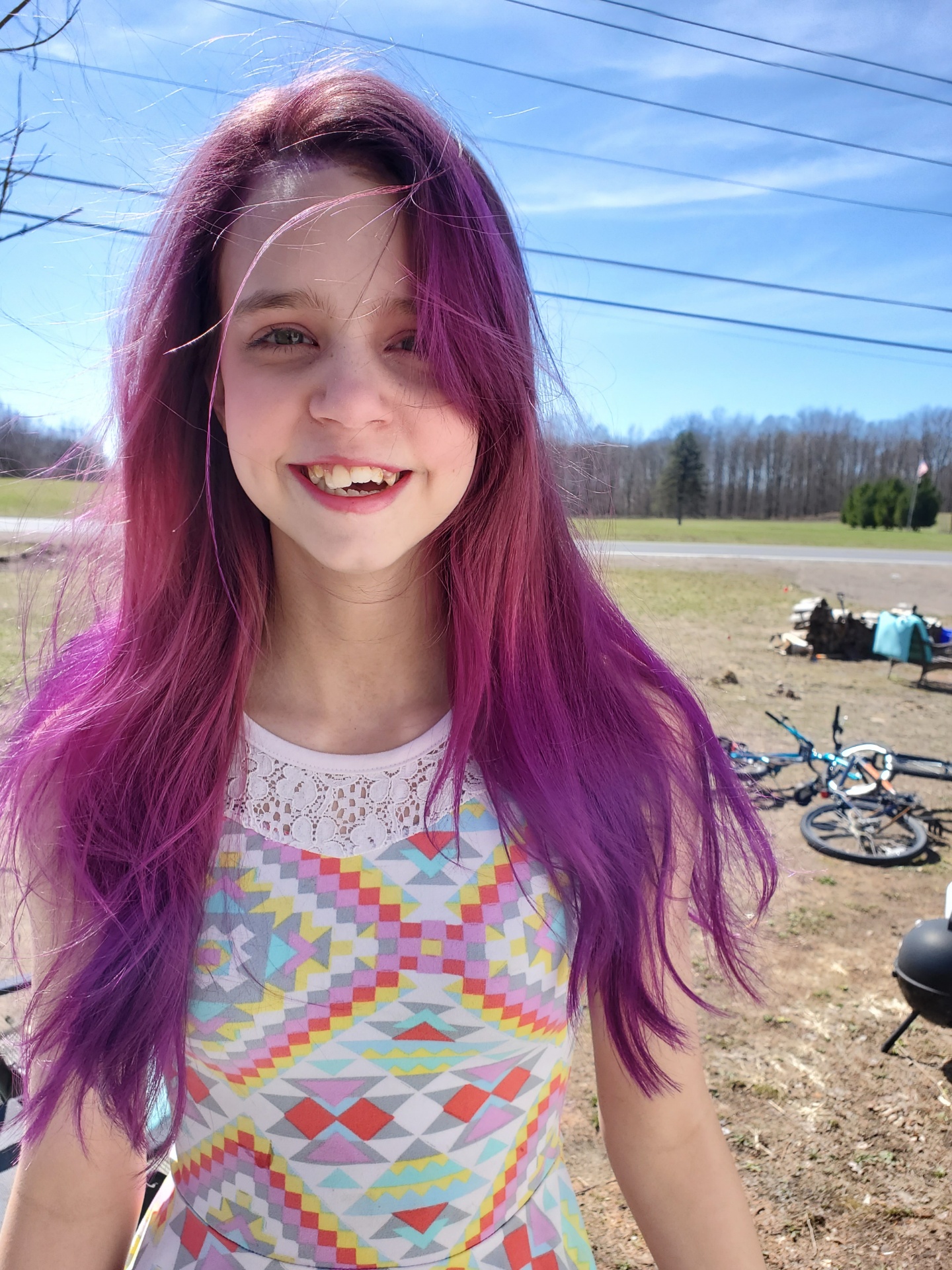 Child's hair color and style. Violet with purple tips.