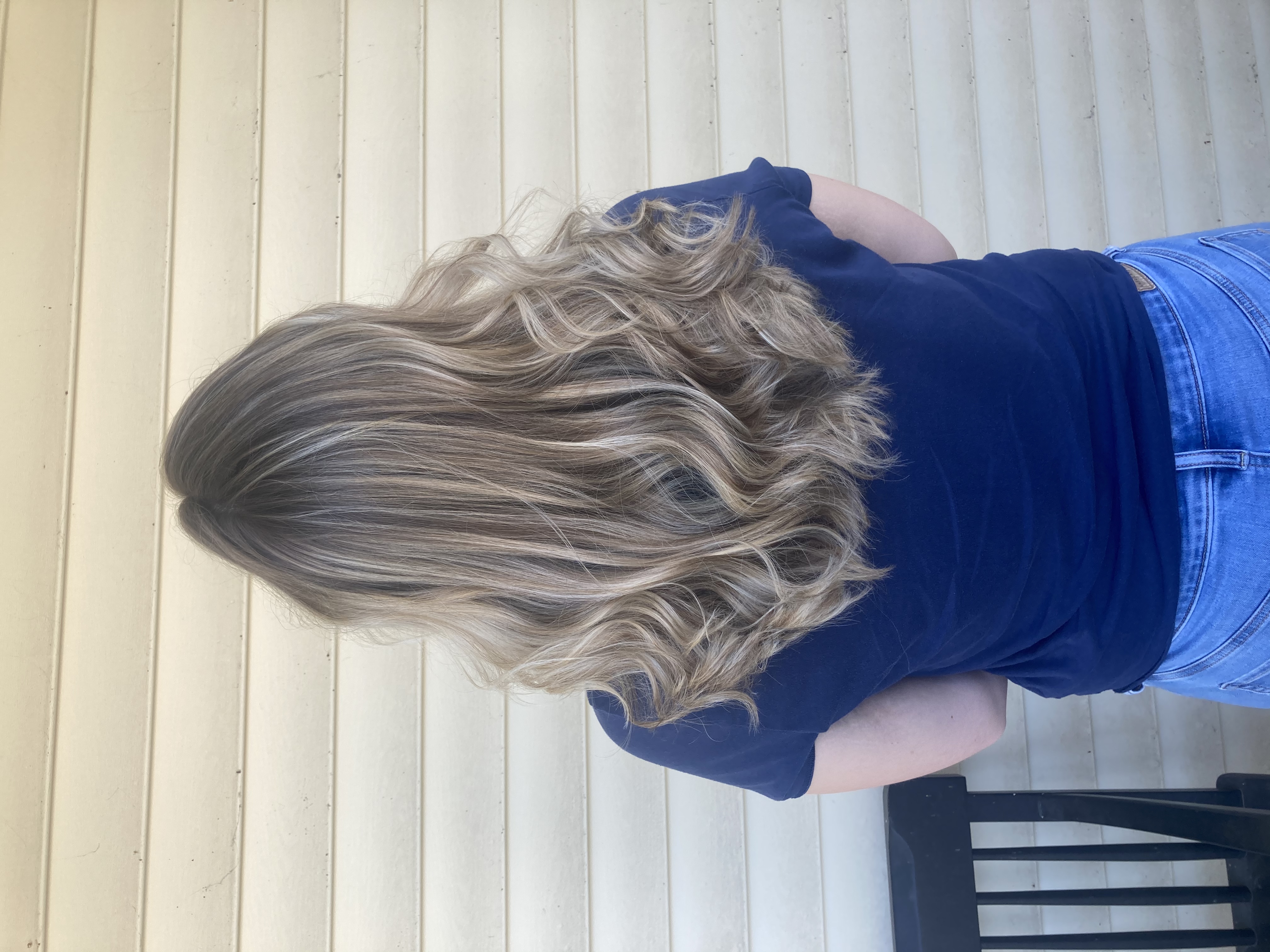 Dyed and styled light brown with blonde highlights.